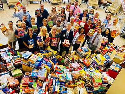 Piedmont Medical Center employees with cereal boxes